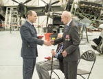 Harry, receiving his medal